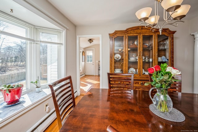 90 Akbar Rd, Stamford, CT 06902 - dining area with a chandelier and a baseboard radiator
