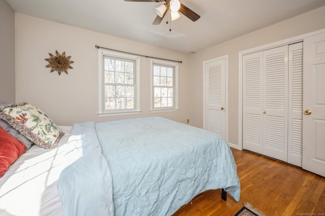 90 Akbar Rd, Stamford, CT 06902 - bedroom featuring two closets, wood finished floors, and ceiling fan
