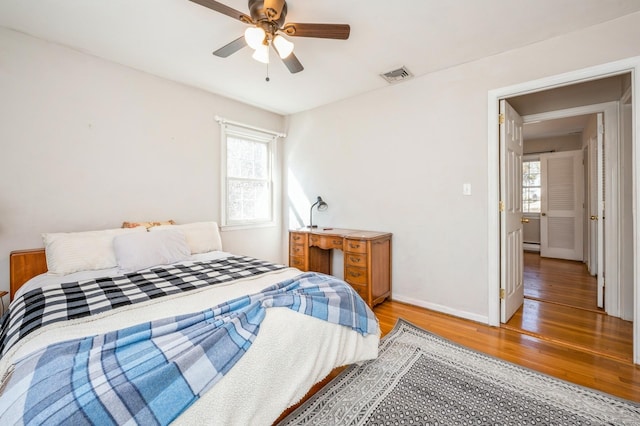 90 Akbar Rd, Stamford, CT 06902 - bedroom with light wood-style flooring, baseboards, and a ceiling fan