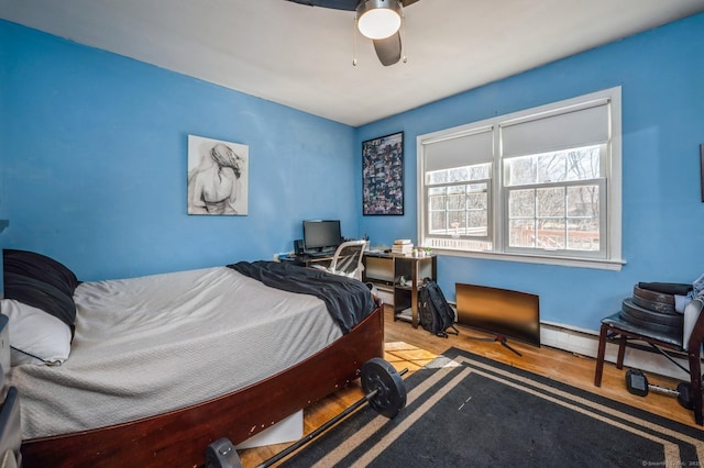 90 Akbar Rd, Stamford, CT 06902 - bedroom with wood finished floors, a desk, a ceiling fan, and baseboards