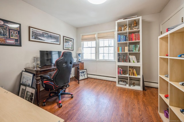 90 Akbar Rd, Stamford, CT 06902 - home office with a baseboard radiator and wood finished floors
