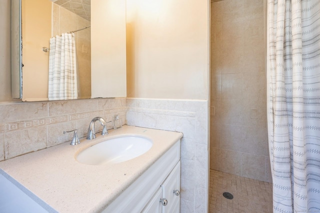 90 Akbar Rd, Stamford, CT 06902 - bathroom featuring vanity and a tile shower