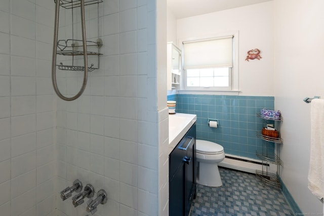 90 Akbar Rd, Stamford, CT 06902 - full bath featuring a baseboard radiator, toilet, tile walls, vanity, and a wainscoted wall