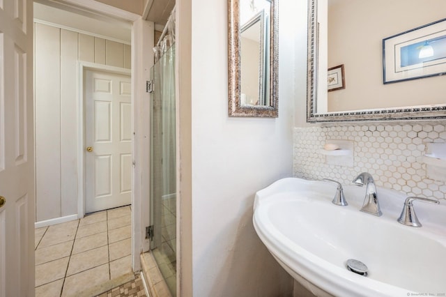 90 Akbar Rd, Stamford, CT 06902 - full bath with a sink, tile patterned floors, tasteful backsplash, and a shower with curtain