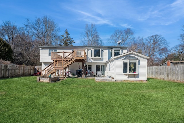 90 Akbar Rd, Stamford, CT 06902 - rear view of property featuring stairway, a wooden deck, and a patio area