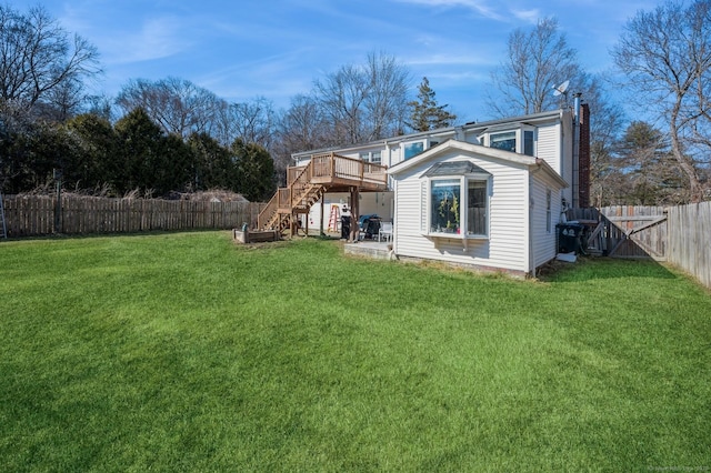90 Akbar Rd, Stamford, CT 06902 - back of property featuring stairway, a wooden deck, and a chimney