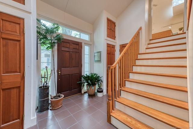 80 W Main St, Chester, CT 06412 - entryway featuring stairway and dark tile patterned flooring