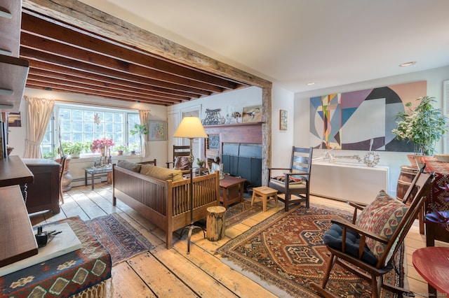80 W Main St, Chester, CT 06412 - living area featuring hardwood / wood-style floors, a baseboard heating unit, a fireplace, recessed lighting, and beam ceiling