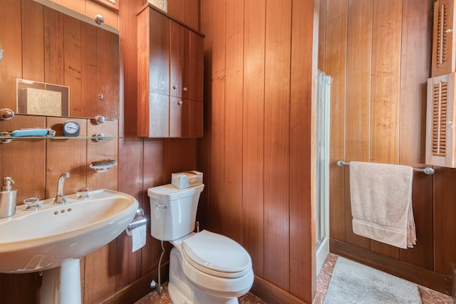 80 W Main St, Chester, CT 06412 - full bathroom featuring a shower stall, wooden walls, toilet, and a sink