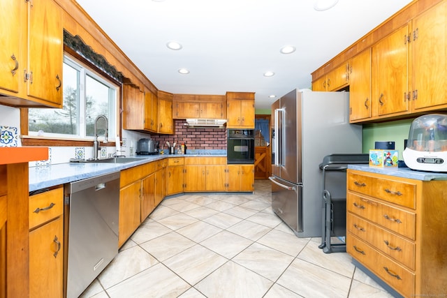 26 Davis Ave, Vernon, CT 06066 - kitchen with black appliances, a sink, under cabinet range hood, tasteful backsplash, and recessed lighting
