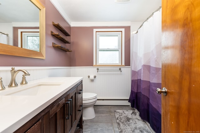 26 Davis Ave, Vernon, CT 06066 - full bath with baseboard heating, wainscoting, plenty of natural light, vanity, and toilet