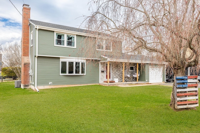 26 Davis Ave, Vernon, CT 06066 - view of front of house with a chimney, a front yard, and central air condition unit
