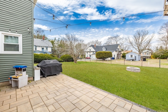 26 Davis Ave, Vernon, CT 06066 - view of patio / terrace featuring a grill, a fire pit, and a residential view