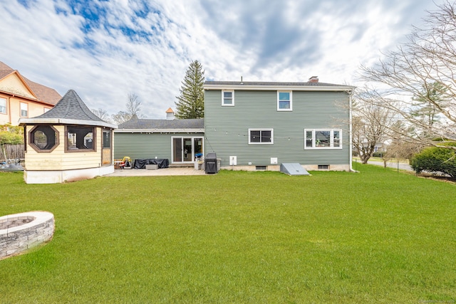 26 Davis Ave, Vernon, CT 06066 - rear view of property with a fire pit, a yard, a chimney, and a patio