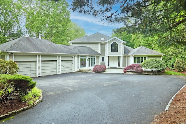 15 Arrowhead Way, Weston, CT 06883 - view of front of home with an attached garage and driveway