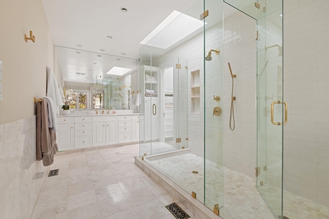 15 Arrowhead Way, Weston, CT 06883 - bathroom featuring a skylight, a stall shower, and vanity
