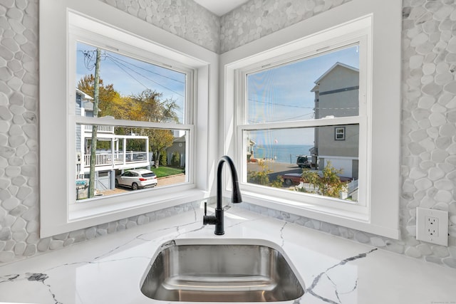 119 Melba St, Milford, CT 06460 - kitchen view of a sink and light stone counters