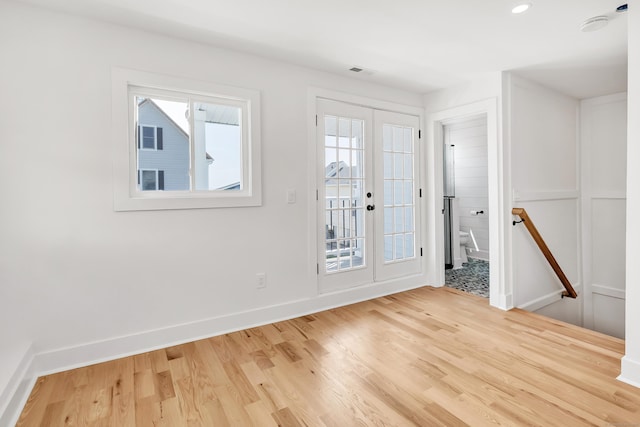 119 Melba St, Milford, CT 06460 - foyer entrance with wood finished floors and baseboards