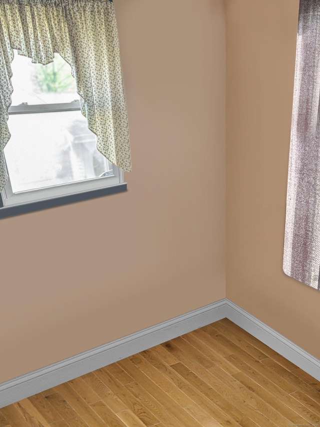 6 Peach St, Waterbury, CT 06708 - unfurnished room featuring light wood-style floors and baseboards
