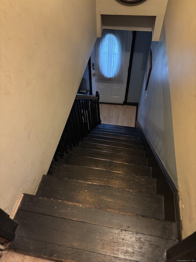 6 Peach St, Waterbury, CT 06708 - stairway with wood finished floors and vaulted ceiling