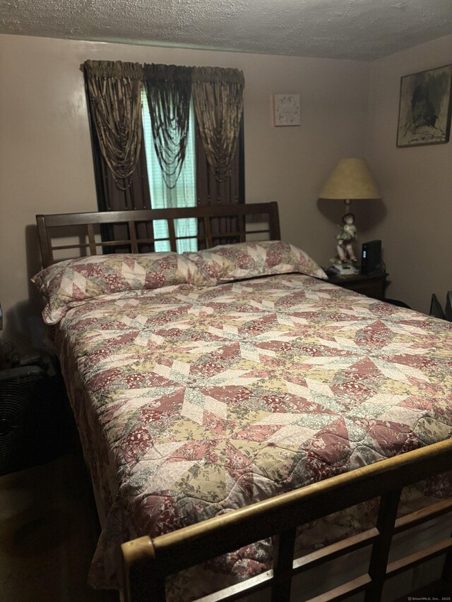 6 Peach St, Waterbury, CT 06708 - bedroom featuring a textured ceiling