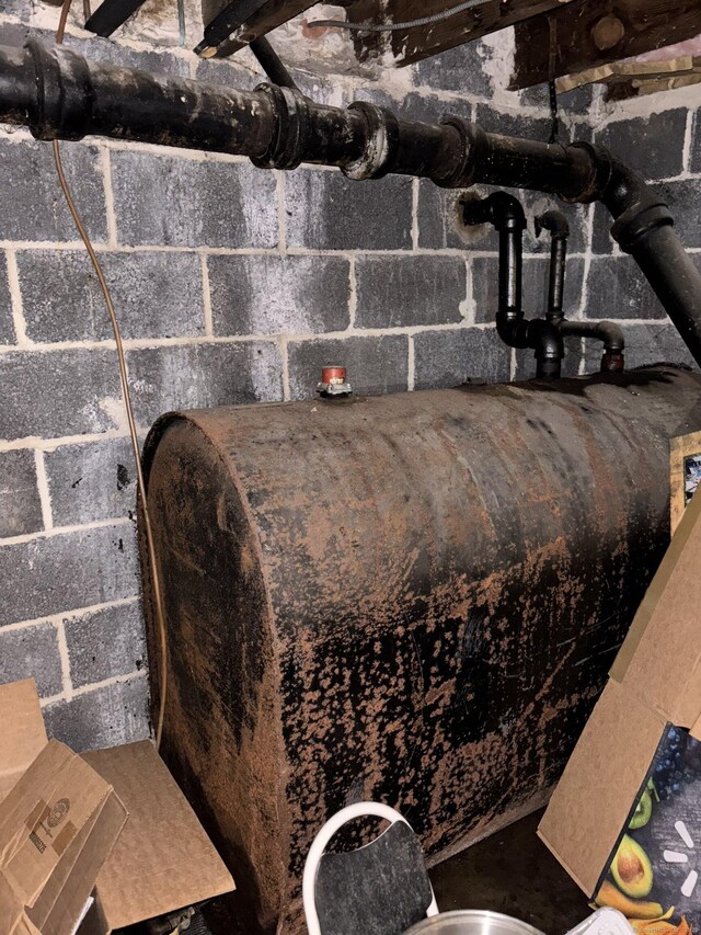 6 Peach St, Waterbury, CT 06708 - basement view of oil tank and concrete block wall