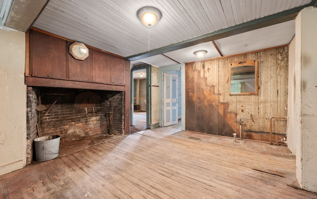 3 Indian Hill Ave, Portland, CT 06480 - unfurnished living room with wood-type flooring and wooden walls