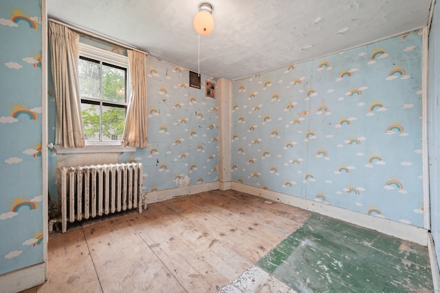 3 Indian Hill Ave, Portland, CT 06480 - empty room with radiator heating unit and baseboards