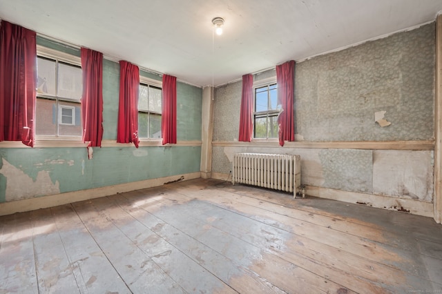 3 Indian Hill Ave, Portland, CT 06480 - spare room featuring radiator and hardwood / wood-style flooring