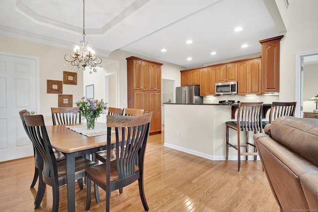 49 Bannan Ln Unit 49, Berlin, CT 06037 - dining room with light wood finished floors, recessed lighting, crown molding, a chandelier, and a raised ceiling