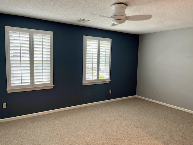 175 Berlin Ave Apt 36, Southington, CT 06489 - empty room with carpet, a textured ceiling, a ceiling fan, and baseboards