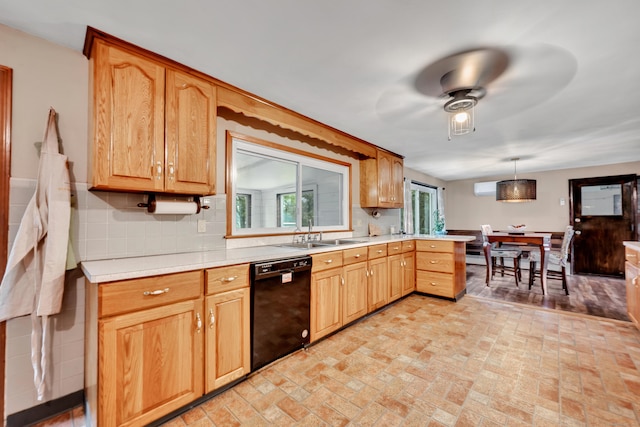 74 Belmont St, New Britain, CT 06053 - kitchen with black dishwasher, a sink, a ceiling fan, light countertops, and brick patterned flooring
