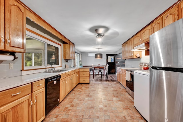 74 Belmont St, New Britain, CT 06053 - kitchen featuring freestanding refrigerator, black dishwasher, a sink, stove, and brick flooring