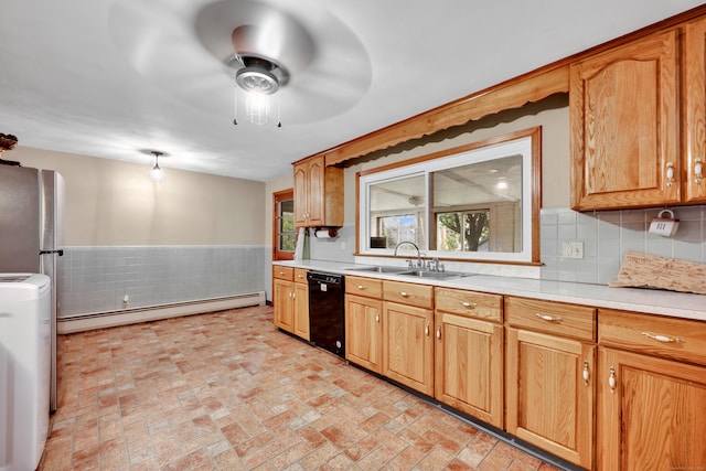 74 Belmont St, New Britain, CT 06053 - kitchen featuring a baseboard heating unit, black dishwasher, a sink, light countertops, and a wainscoted wall