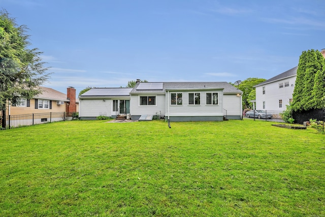 74 Belmont St, New Britain, CT 06053 - back of property with entry steps and solar panels