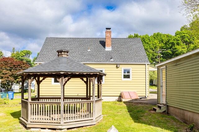 12 Pleasant Dr, Hamden, CT 06514 - back of house featuring a gazebo, roof with shingles, a yard, entry steps, and a chimney