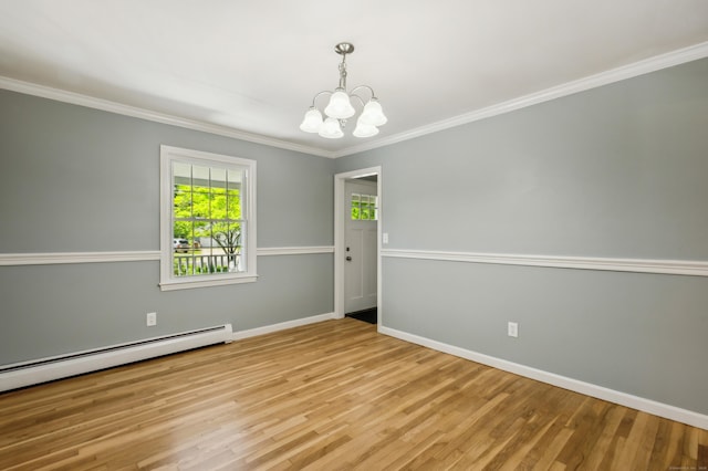 57 Quailcrest Rd, East Lyme, CT 06333 - unfurnished room featuring a chandelier, a baseboard heating unit, baseboards, wood finished floors, and crown molding