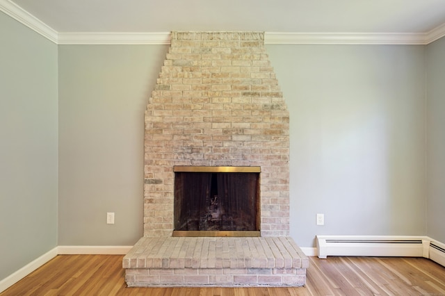 57 Quailcrest Rd, East Lyme, CT 06333 - detailed view of crown molding, wood finished floors, baseboards, and a fireplace