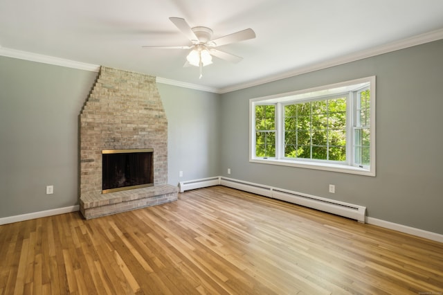 57 Quailcrest Rd, East Lyme, CT 06333 - unfurnished living room with wood-type flooring, ceiling fan, healthy amount of natural light, baseboard heating, and ornamental molding