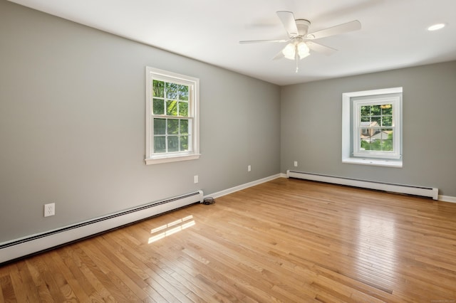 57 Quailcrest Rd, East Lyme, CT 06333 - unfurnished room featuring a baseboard radiator, light wood-style flooring, and ceiling fan