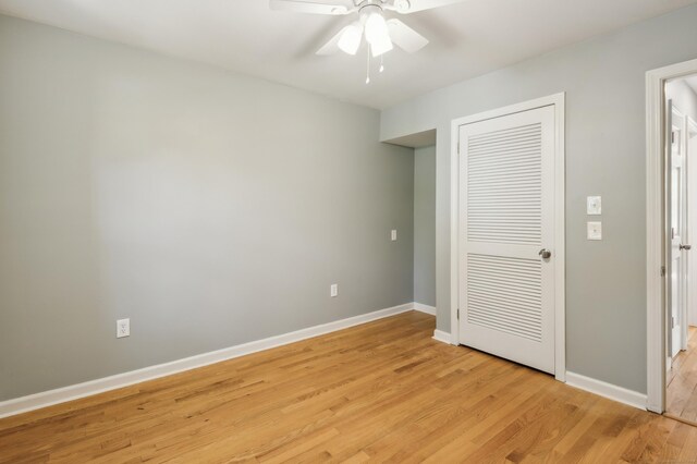57 Quailcrest Rd, East Lyme, CT 06333 - unfurnished bedroom featuring light wood-type flooring, baseboards, and a closet