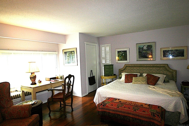 575A Village St, Southbury, CT 06488 - bedroom with dark wood-type flooring and a desk
