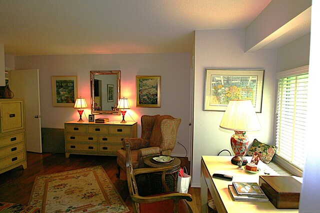 575A Village St, Southbury, CT 06488 - living area featuring dark wood finished floors and plenty of natural light
