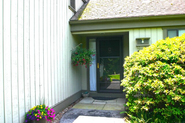 575A Village St, Southbury, CT 06488 - view of exterior entry featuring roof with shingles