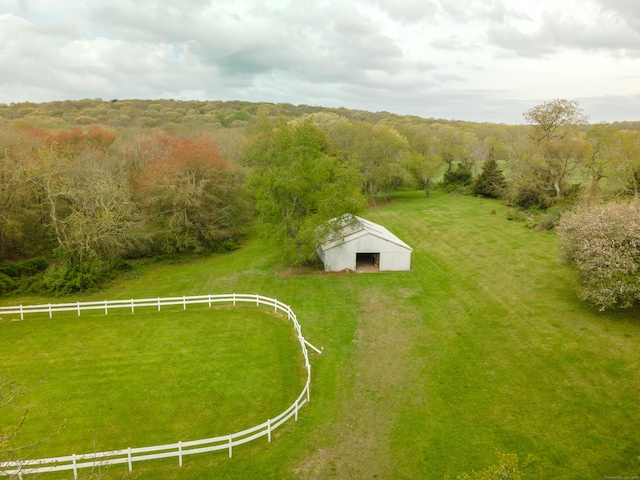 drone / aerial view of a heavily wooded area