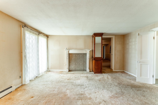unfurnished living room featuring baseboard heating, carpet floors, a fireplace, and a textured ceiling
