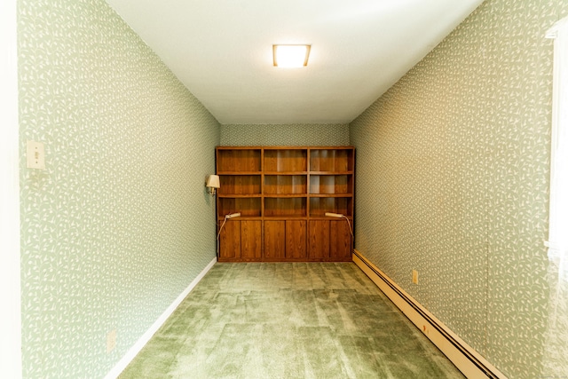 storage area with a baseboard heating unit