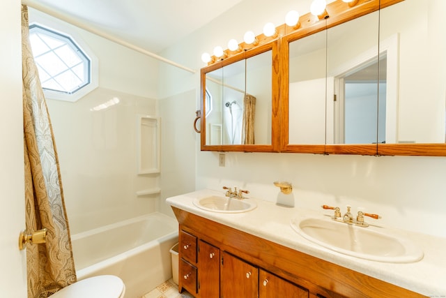 full bath with shower / tub combo, double vanity, and toilet
