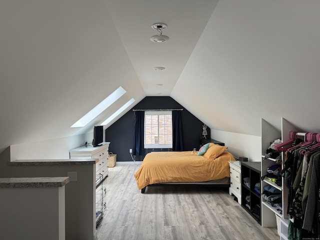 14 Russell St, Hamden, CT 06517 - bedroom with a skylight, light wood-style floors, and lofted ceiling