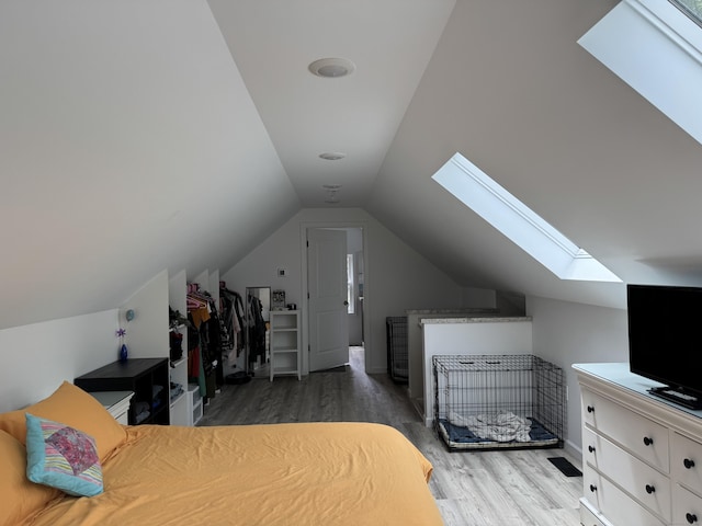 14 Russell St, Hamden, CT 06517 - bedroom featuring a skylight, wood finished floors, and vaulted ceiling